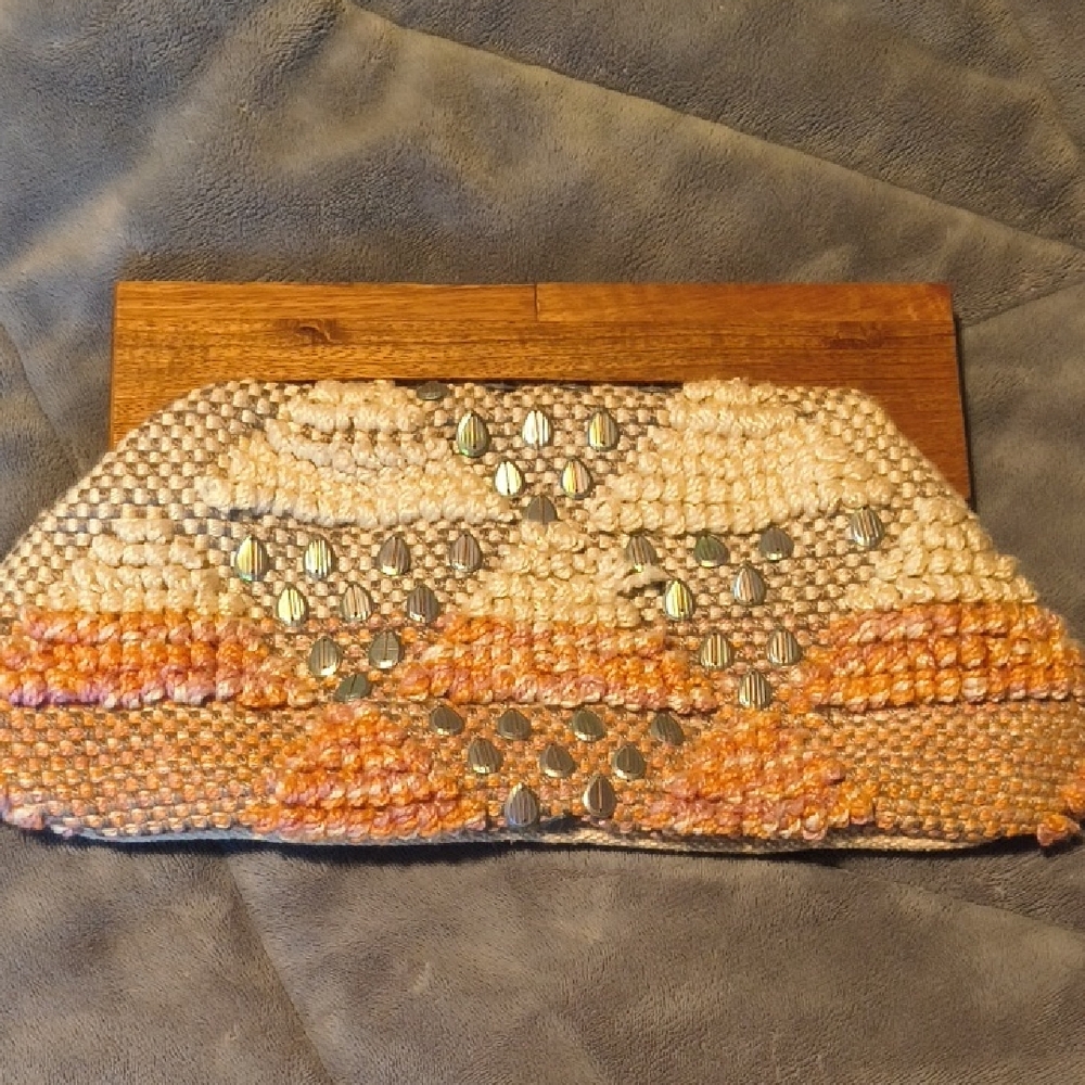 Handcrafted wood handle clutch